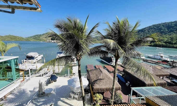 Itanema House | Angra beach house with exclusive pier by the sea + barbecue 5 minutes from the beach