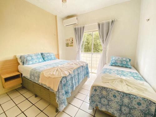 Sao Luis Apartment | Apartamento amplo perto da Praia da Litorânea - Carmona Temporadas
