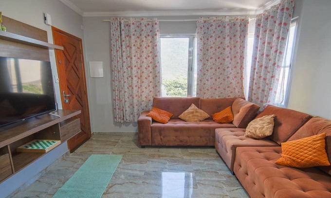 Centro Apartment | Apartamento em Peruibe frente mar com garagem