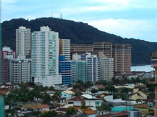 Canto do Forte Apartment | Apartamento no Canto do Forte, Wi-Fi, Estacionamento gratuito e Churrasqueira