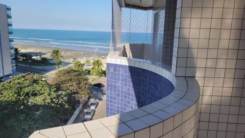 Caicara Apartment | Apartamento Praia Grande 30 metros da praia Estacionamento Gratuito e WI-FI