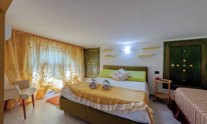 Salice Salentino House | Apartment 'Il Geco - Green' with Shared Terrace, Wi-Fi and Air Conditioning