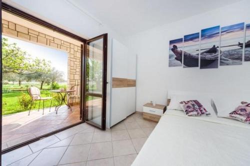 Zaton Apartment | Apartment in Zaton (Zadar) with Terrace, Air conditioning, Wi-Fi, Washing machine (4814-4)