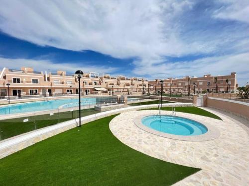 Pilar de la Horadada Apartment | Apartment with private, heated jacuzzi, AC, pool