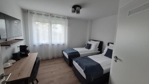 Sondelfingen House | Apartments Seibel Doppel-Zweibettzimmer mit Bad