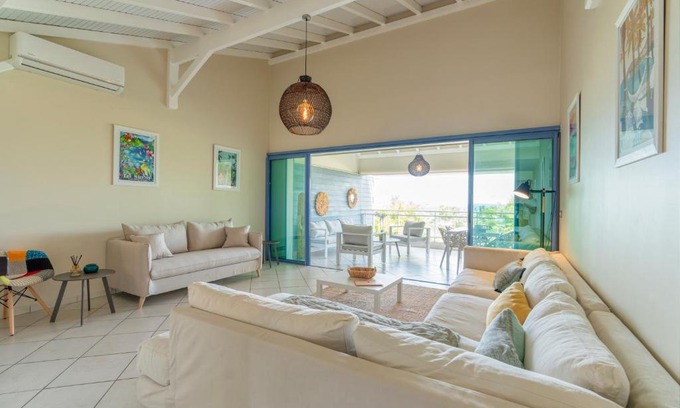 Sainte-Anne Apartment | Appartement magnifique à 2 minutes de la plage de Sainte Anne