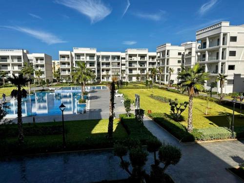 Cherrat Apartment | APT Luxueux à Costa Beach 3 avec Piscine et accès Plage