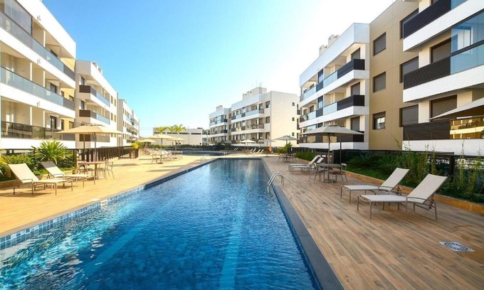 Cachoeira do Bom Jesus Apartment | Apto 100m da Praia Com Piscina Aquecida e Lazer