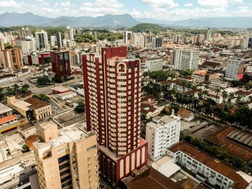 Centro Apartment | Apto confortável cozinha, smart tv