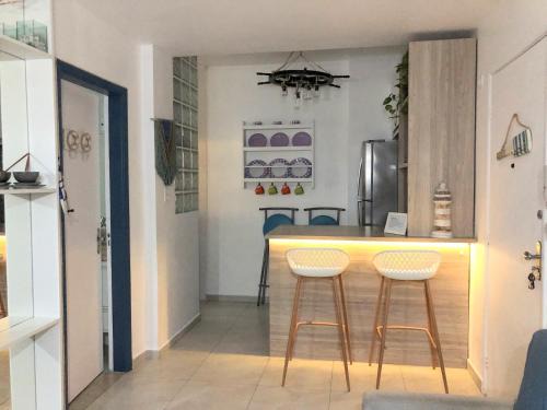 Aparecida Apartment | Apto em Santos com AR e Wi-Fi na rua da praia