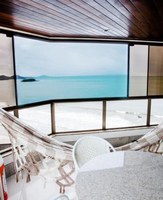 Barra Sul Apartment | Apto frente mar Bal Camboriu pé na areia churrasqueira carvao na sacada fantástica e encantadora vista mar