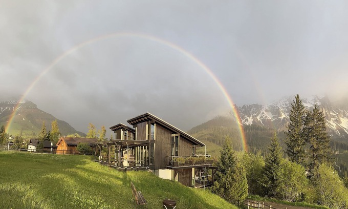 Carezza House | Architect's house Karersee, view of rose garden, Latemar and western Alps