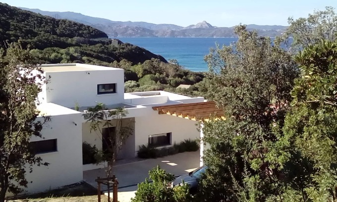 Farinole House | Architect-designed house, 50 meters from a white sandy beach, splendid sea view
