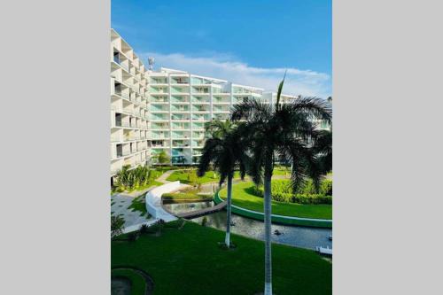 Flamingos Apartment | Aria Ocean departamento a pie de playa Sanitizado