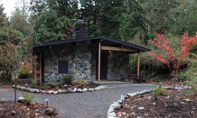Geneva House | Artists Stone Cabin with Bathhouse, Sauna & Cedar Soaking Tub