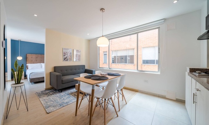 Financial District Apartment | Artsy Place in Chapinero Alto with Laundry Facilities