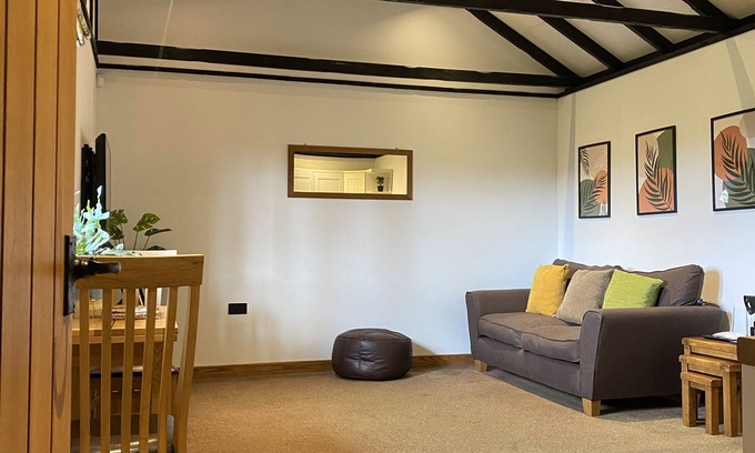 Runnymede Cabin | Ash lodge sleeps two people in a peaceful, private setting.