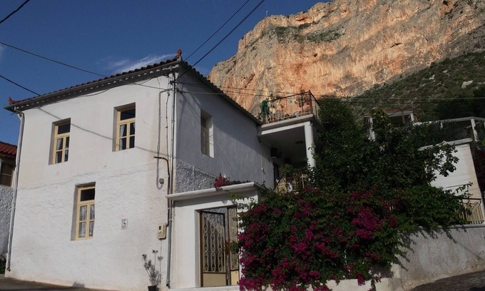 Leonidio House | At the foot of the red cliff. Leonidio. Greece.