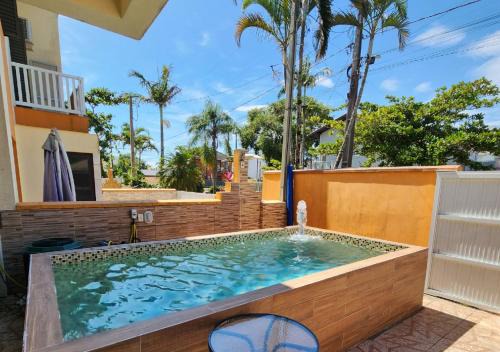 Pontal do Parana House | ATAMI STAY Casa em Condomínio com Piscina Aquecida a 1 Quadra do Mar