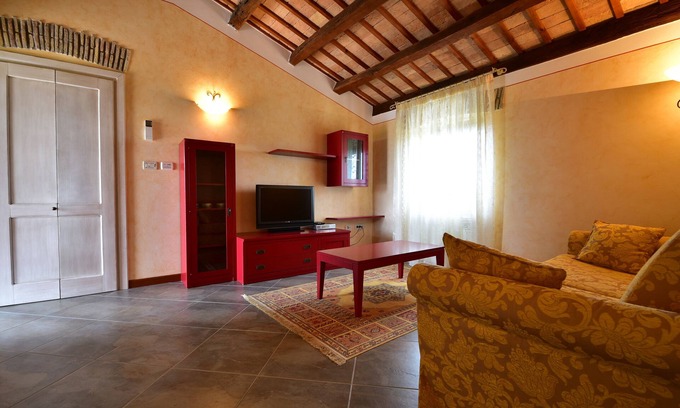 Vilanija Apartment | Attic apartment "Red" with private terrace olive garden view