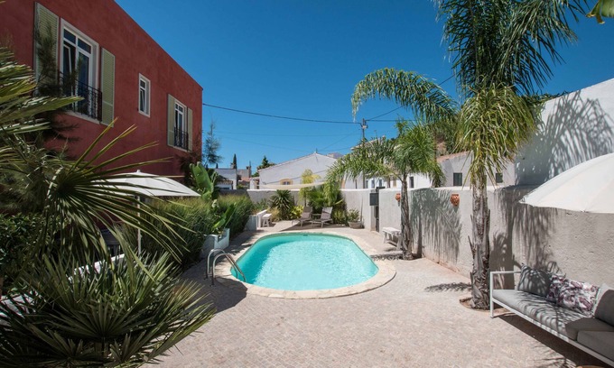 Santa Catarina da Fonte do Bispo Villa | Attractive Villa for Families/Groups with nice Garden and Pool