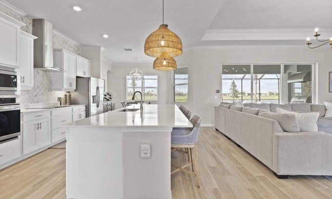 Immokalee House | Ave Maria, The National Golf Course, swimming pool and hot tub.