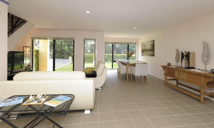 Corlette House | Bagnall Views Stylish and modern duplex across the road to the waters edge