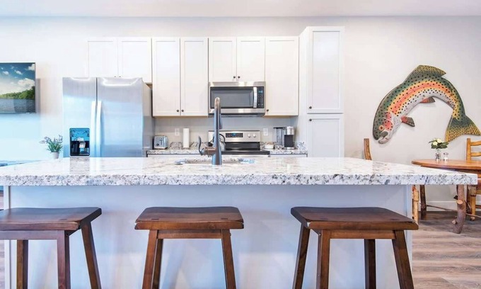 Swan Valley Condo | Basecamp Stays: Mtn Views, Patio, & South Fork Fun