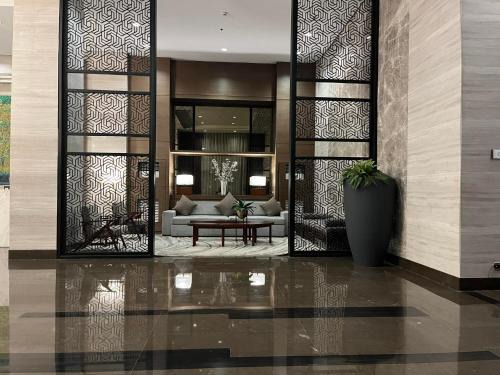 Pasay Apartment | Bayfront Suite in Pasay, Manila Near NAIA Terminal, PICC, Star City, MOA and US Embassy - Pet-Friendly, Free Pool, Wi-Fi & Netflix