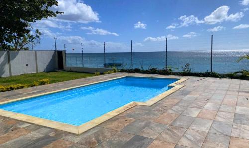 Tombeau Bay Villa | Baywatch - Pieds dans l'eau avec piscine