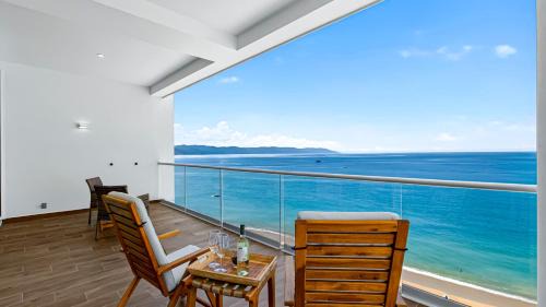 Las Glorias Apartment | Beachfront 2BR Condo - Resort Pools & Scenic Balcony Views