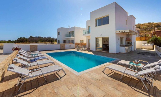 Pomos Villa | Beachfront 4 bed villa with sea views.