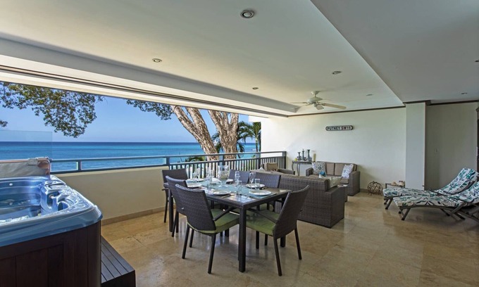 Old Trees Bay Apartment | Beachfront apartment at Paynes Bay Beach with jacuzzi