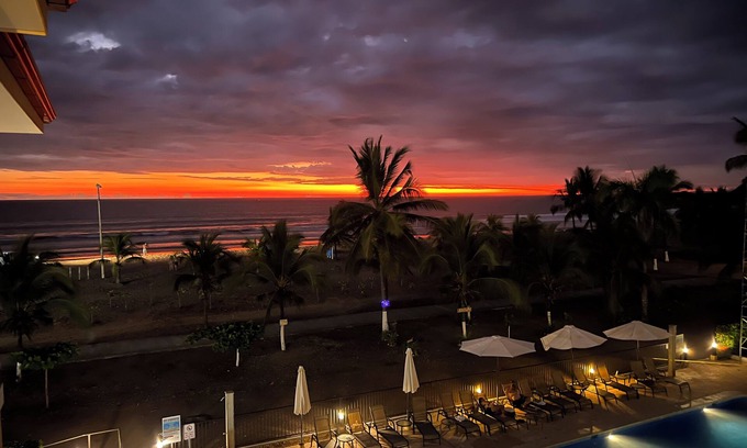 Barrio Los Villalobos Condo | Beachfront condo with rooftop patio and amazing views in the heart of Jaco .