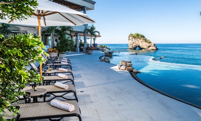 South Shore Hotel Area Villa | Beachfront Estate with sunset views over the famous Los Arcos of Puerto Vallarta