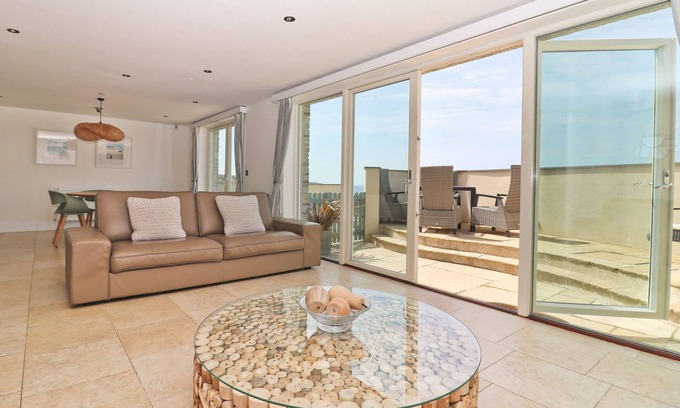 Constantine Bay Apartment | Beachside apartment with a private patio garden and beautiful sea views