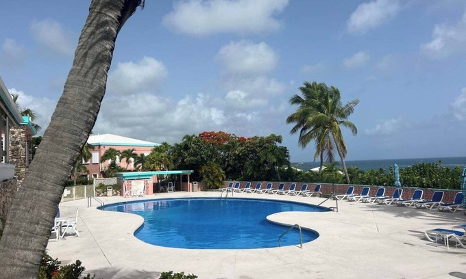 Cotton Valley Condo | Beachy 2 Bedroom Coakley Bay Condo with AC, pool and backup generator.