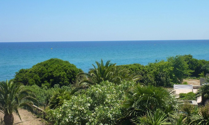 Santa-Lucia-di-Moriani Apartment | Beautiful flat , rated 2 stars on the beach