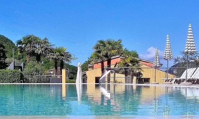 Garda Apartment | Beautiful apartment for 4 people with A/C, pool, WIFI, TV, patio, panoramic view and parking