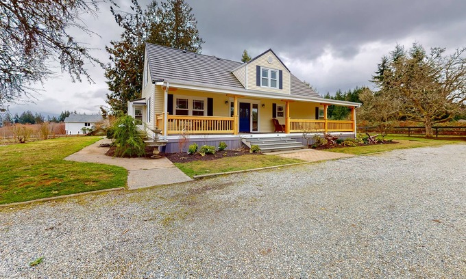 Clinton House | Beautiful farmhouse with private hot tub, pastoral views, gas fireplace, & porch