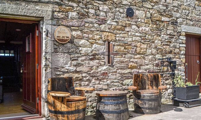 Maryport Cottage | Beautiful features with exposed stonework and beams.