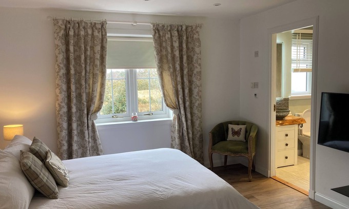 Dornoch Apartment | Beautiful garden apartment surrounded by woodland and fields.