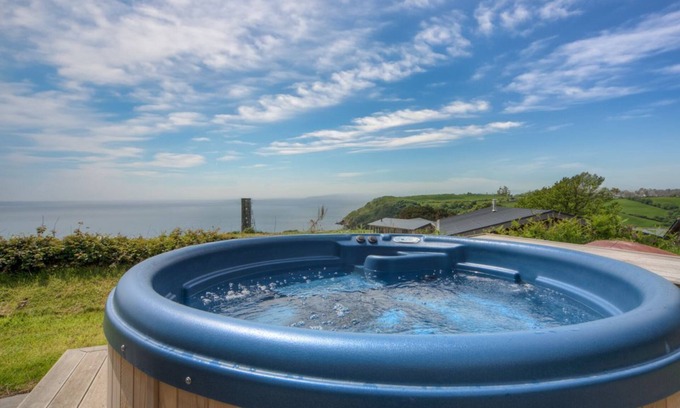 Talland House | Beautiful holiday home with hot tub, just a walk away from Talland beach.