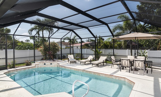 Naples Park House | Beautiful Home & Amazing Pool Oasis, Close to Beach, FREE Bikes, Full Amenities