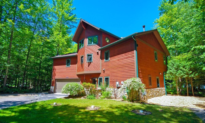 Empire House | Beautiful home on Little Glen Lake with a pool table, dock, fireplace, AC