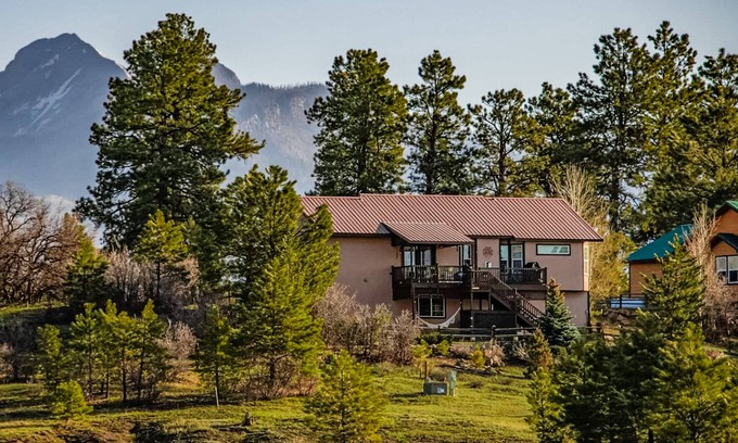 Pagosa Highlands House | Beautiful home with mountain view, fireplace, game room, balcony, & washer/dryer