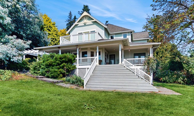 Indianola House | Beautiful home with foosball table, waterfront views, fireplace, basketball cour