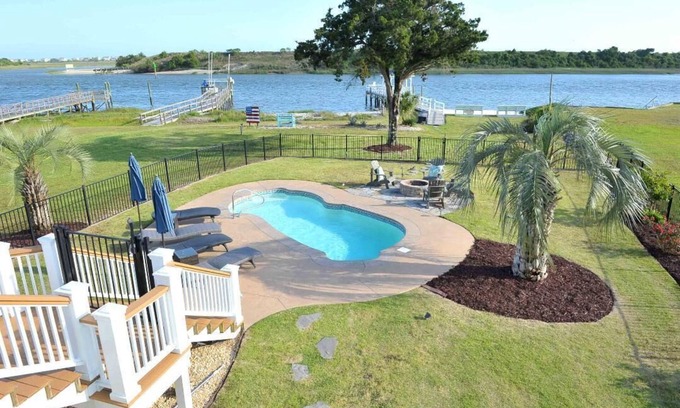 Shallotte House | Beautiful ICW views! Private pier, pool, hot tub, fire pits, and more!