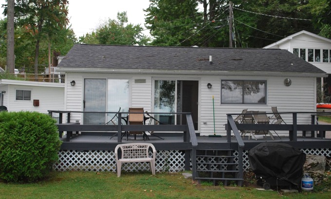 Gilford Cottage | Beautiful Lakefront Cottage with 21' dock space