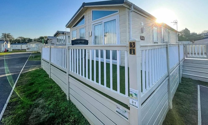 Clacton-on-Sea Cabin | Beautiful lodge with decking at Oaklands Holiday Park in Essex ref 39031BG